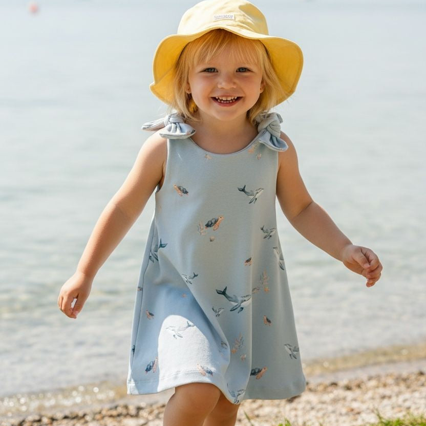 Mädchenkleid mit Schleife und Zipfelsaum, Wal
